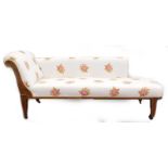 A late 19thC walnut chaise longue, upholstered in cream and floral fabric, on square tapering legs.