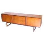 A 1960/70s White and Newton teak low sideboard in the Danish style, with an arrangement of two