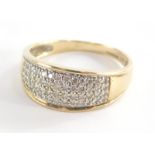 A 9ct gold half hoop eternity ring, set with pave set cz stones, in a white gold setting, ring