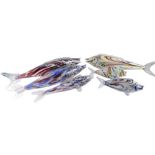 A collection of six Murano type mottled glass fish, the largest 60cm long.