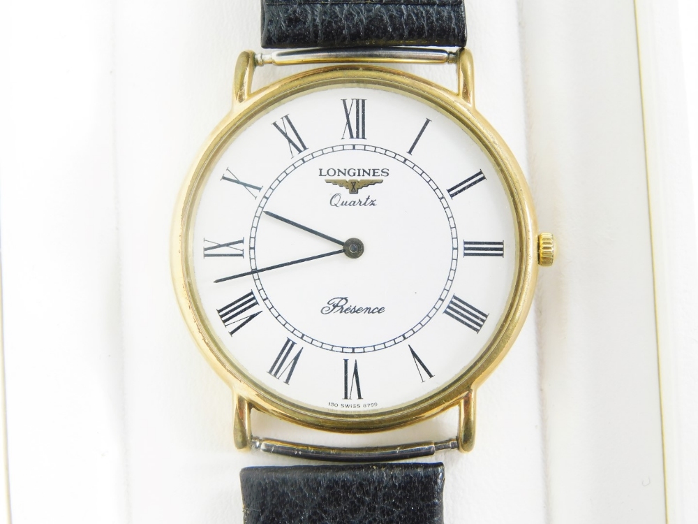 A Longines Precision wristwatch, with a stainless steel and gold plated wristwatch head on black
