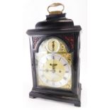 John Richardson, London. A George III ebonised bracket clock, the arched dial with silver chapter