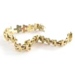 A 9ct gold bracelet, with table links and slide in clip clasp, 22cm long, 20.2g.