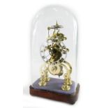 A 19thC brass skeleton clock, under a glazed dome, on a mahogany base, with a 12cm Roman numeric