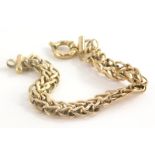 A 9ct gold bracelet, with V shaped and hammered design links, in circular heavy duty clasp, 20cm