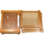 A set of ten oak photograph or picture frames, in the Arts and Crafts style, 51.5cm high, 61cm