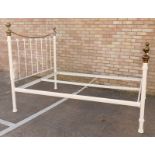 A Victorian style cream painted and brass mounted double bed head and foot, 152cm wide.