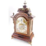 A late 19thC German rosewood mantel clock, with gilt metal mounts, the domed top embellished with