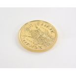 A French gold coin, 14.7g.
