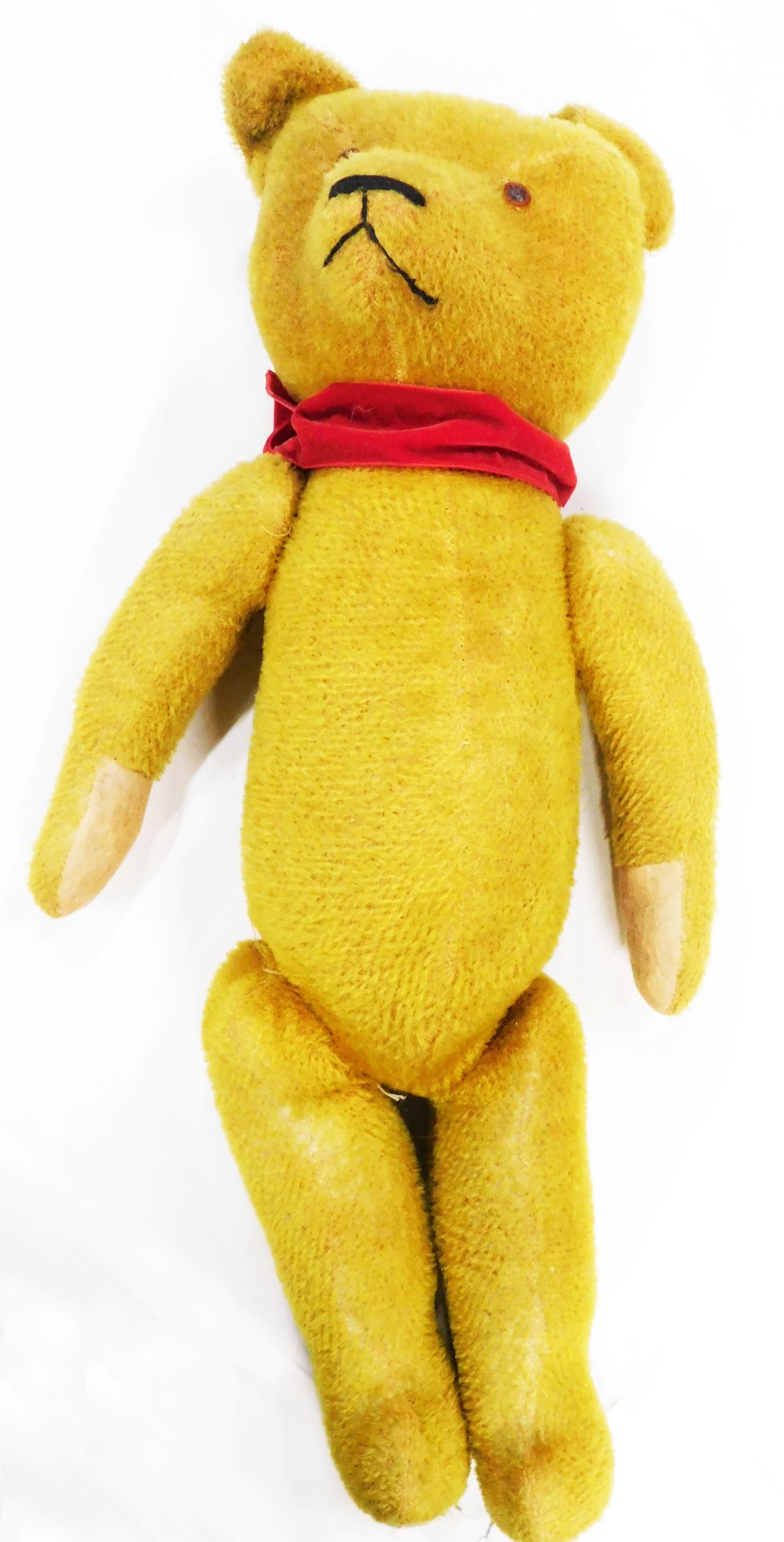 A vintage teddy bear, with growler, (AF), 58cm long.
