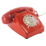 A GPO red cased dial up phone, 746R-R.