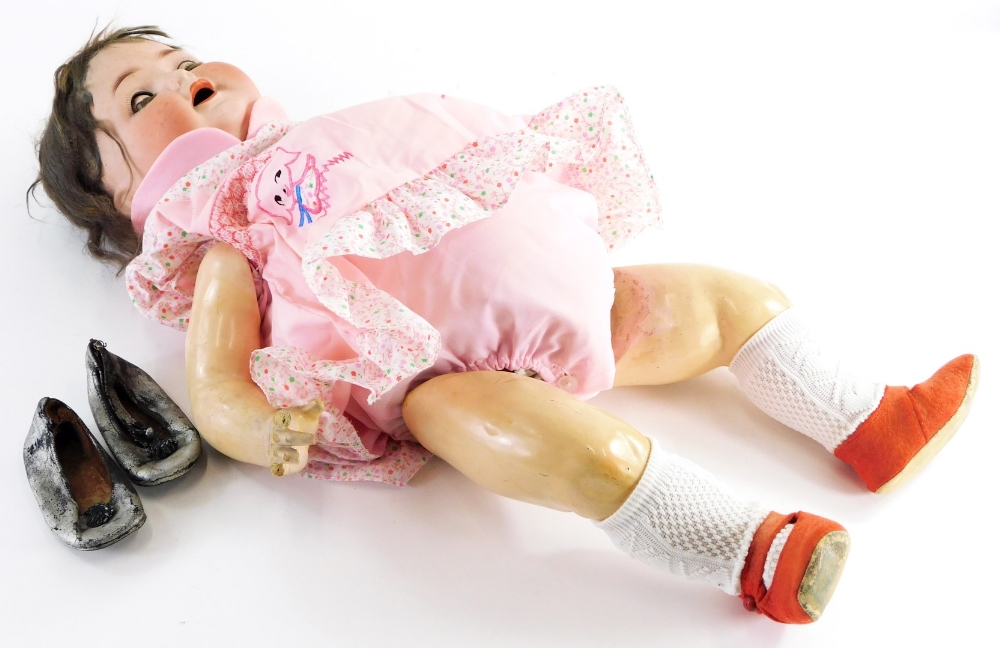 A Heubach Koppelsdorf bisque headed doll, numbered 342.9, 59cm long.
