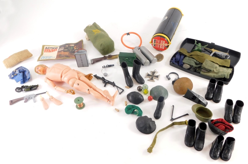 A collection of Action Man related items, to include Action Man, various hats, boots, guns, official