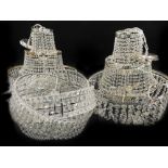 A collection of modern silvered metal and cut glass chandeliers, to include a pair of three tier