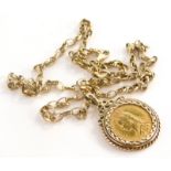 A Victorian full gold sovereign pendant and chain, the sovereign dated 1889 in a 9ct gold pendant