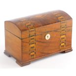 A 19thC and later dome top tea caddy, with parquetry cross banded decoration, the hinged lid
