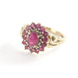 A 9ct gold cluster ring, with oval cut ruby in claw setting surrounded by cz stones and outer