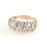 A diamond set dress ring, of half hoop design, with seven rows of round brilliant cut diamonds and