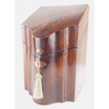 A George III mahogany boxwood and ebony strung slope top knife box, the hinged lid enclosing a