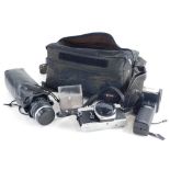 An Olympus OM1 camera, various lenses, and tri pod.