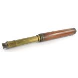 A brass and mahogany three draw telescope stamped Harris & Sons, Day or Night, 38cm long closed.