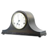 A 20thC oak cased Napoleon hat mantel clock, with Arabic numeral dial.