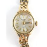 A Rotary 9ct gold ladies wristwatch, with small silver coloured circular dial, 1.2cm wide, on a