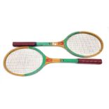 A pair of Russia Olympics wooden tennis rackets, decorated in transfers with the Olympic symbol,