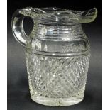 An early 20thC lead crystal jug, 16cm high.