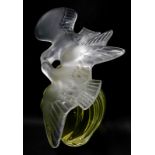 A Marc Lalique for Nina Ricci 'L'ai air du Temps' perfume bottle, the frosted glass stopper modelled