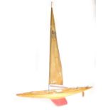 A 1960s/ 70s canoe stern ten raiter plank on frame pond yacht, pennant number 1684, 193cm wide.