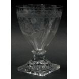 A late 18thC/early 19thC glass rummer, with engraved decoration of leaves, birds surrounding a