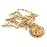 An Elizabeth II full gold sovereign pendant and chain, dated 1966 in scroll detailed 9ct gold