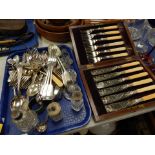 A group of silver plated cutlery, cased set of silver plated and bone handled six place fish knives