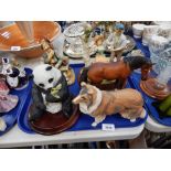 A group of various ornaments, to include Beswick dogs, seated panda, Capodimonte style figure, vario