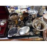 A group of silver plated wares, to include a silver plated rose hand mirror, pin dishes, ice bucket,