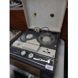 A Civic reel to reel tape player.