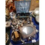 A group of silver plated wares, silver plated frames, souvenir spoons, cased cutlery sets, etc. (1 t