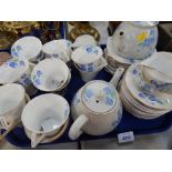 A Colclough china part tea service, in blue pansy pattern, comprising tea cups, saucers and teapots.