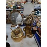 A group of copper and brass wares, a brass oil lamp, dressing table mirror, miniature fireside compa