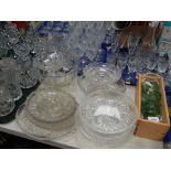 A large group of assorted glass ware, drinking glasses, tumblers, jugs, serving bowls, etc. (5 trays