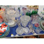 A group of glassware, to include a cranberry glass bowl, a Caithness glass vase, decanter, drinking