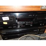 A Yamaha Natural Sound compact disc player CDC-675, and a Natural Sound cassette deck KX-W321. (2)