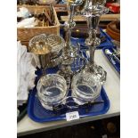 Silver plated wares, to include a pair of silver plated candlesticks, candle stand, toast rack, rose