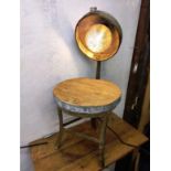 A small vintage galvanised steel milking stool, with newly added rustic galvanised hood, to create a