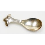 An Arts and Crafts hammered trefoil caddy spoon, by William Thomas Pavitt, London 1913, 9cm long.