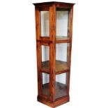 A Jig style hexagonal display cabinet in three sections, on plain base with key, 182cm high, 62cm wi