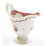 A late 18thC Newhall porcelain fluted cream jug, pattern number 173, with rose band decoration withi