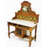 An Edwardian mirror and tile back marble top wash stand, of rectangular form, on turned front legs,