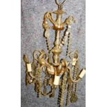 A Venetian style chandelier, with spirally twisted arms and cut drops, (AF).